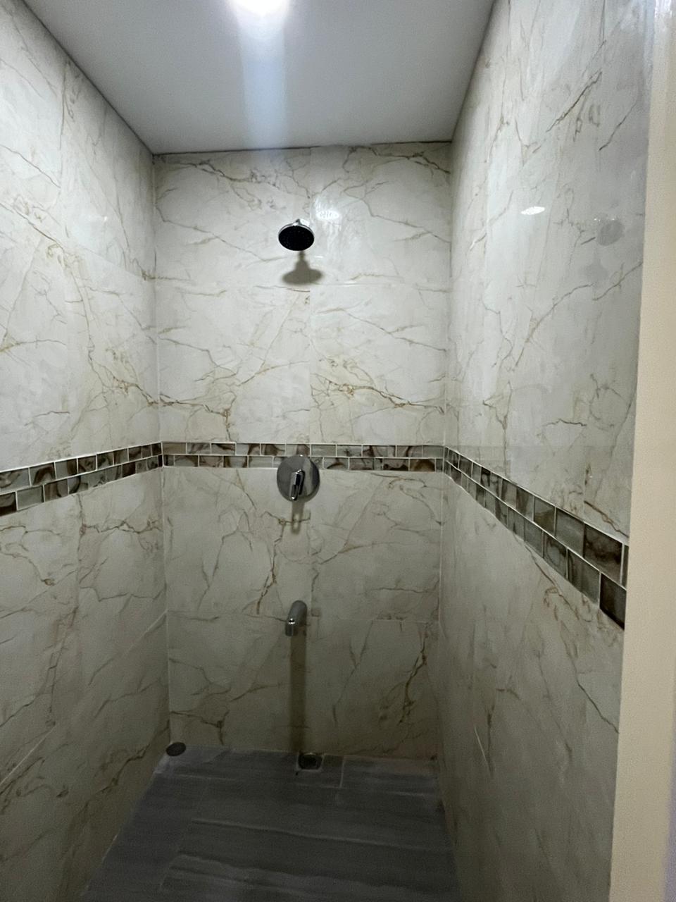 Marble-finished shower