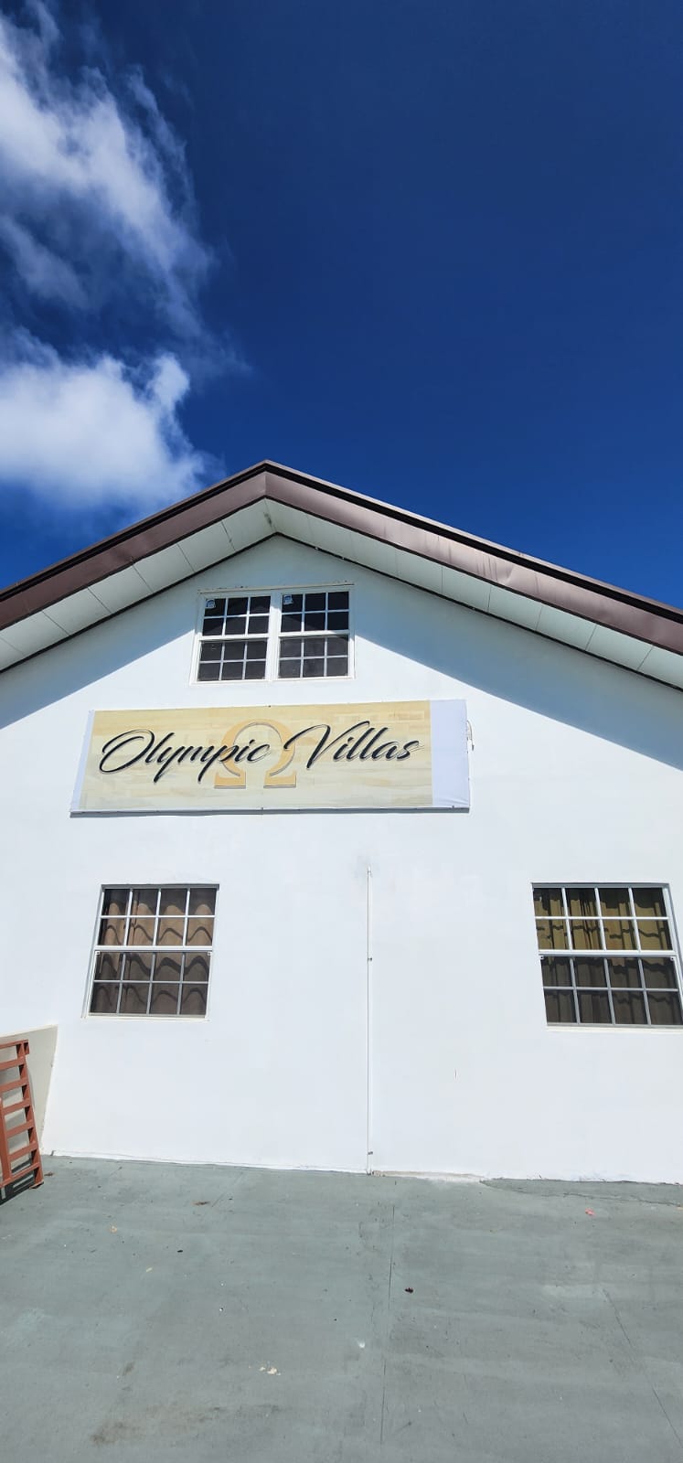 Olympic Villas exterior sign