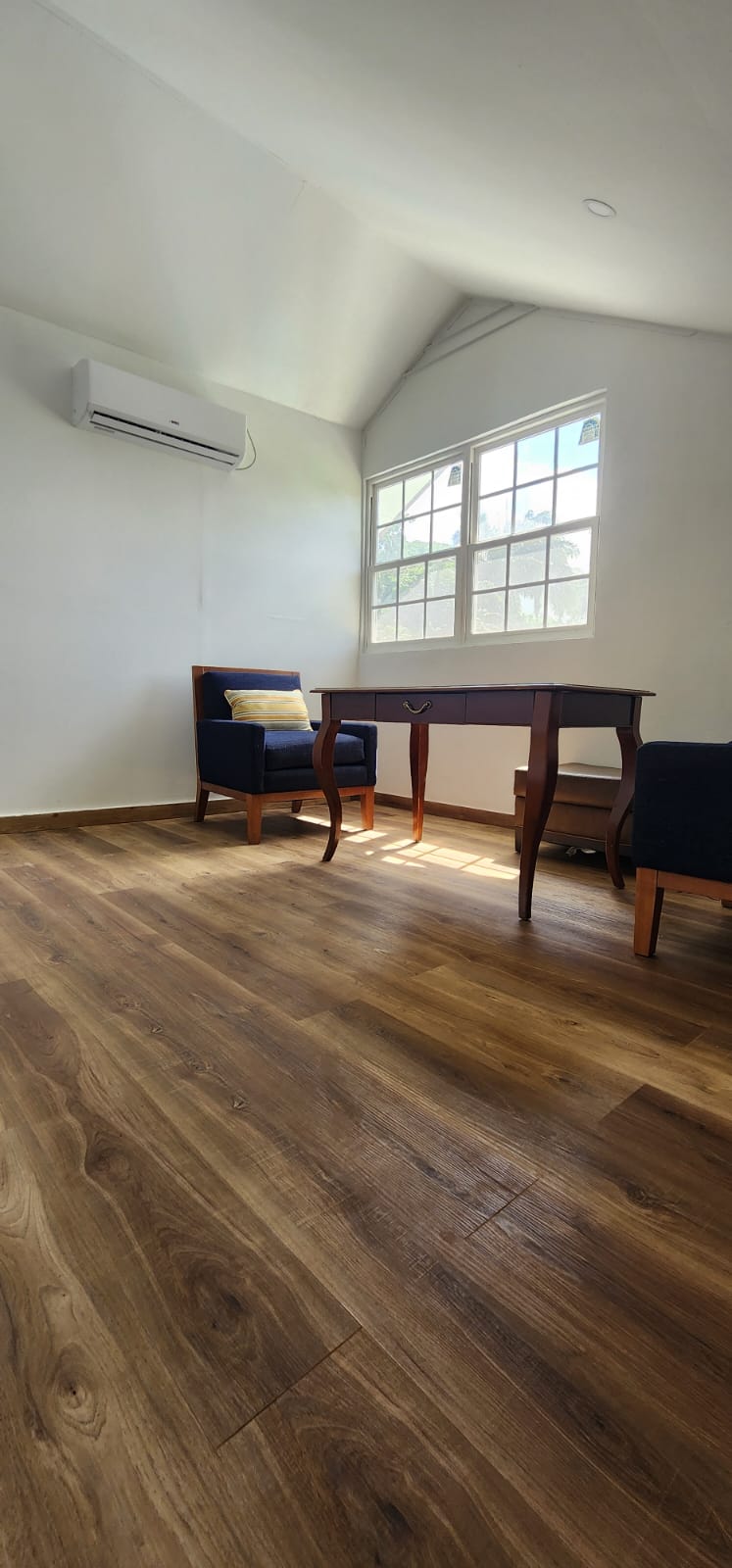 One-bedroom apartment study area with mini-fridge